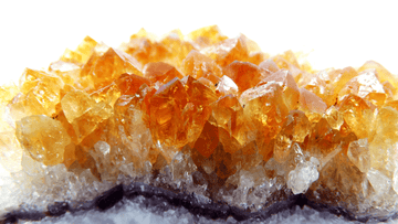 Sparkling Sunlight: Exploring the Allure, Benefits, and Spiritual Meaning of Citrine Crystals and Jewelry - Uncover the radiant charm, abundance, and positivity of citrine with Ancient Infusions.