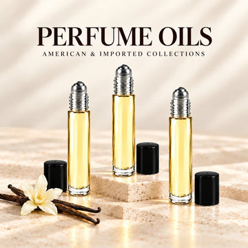 American and Imported perfume oil roller bottles on soft ivory stone