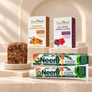 Herbal soaps and neem body care products on ivory stone