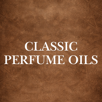 Classic perfume oil bottles by Ancient Infusions displayed together, representing timeless, alcohol-free fragrance oils people have loved for generations.