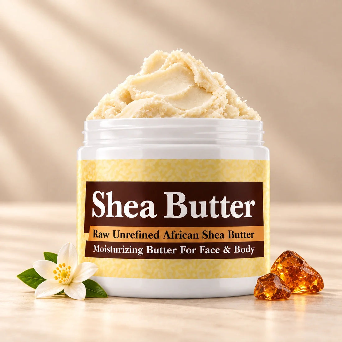 Amber Love Shea Butter in an open white jar with textured ivory shea butter and subtle scent accents on a soft cream background.