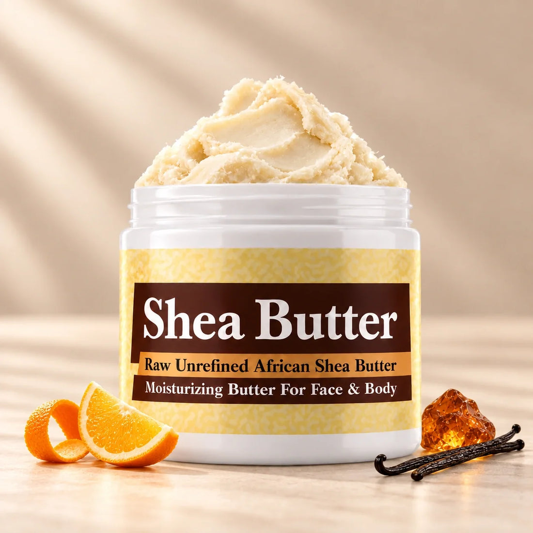 Amber Shea Butter in an open white jar with textured ivory shea butter and simple scent accents on a soft cream background.