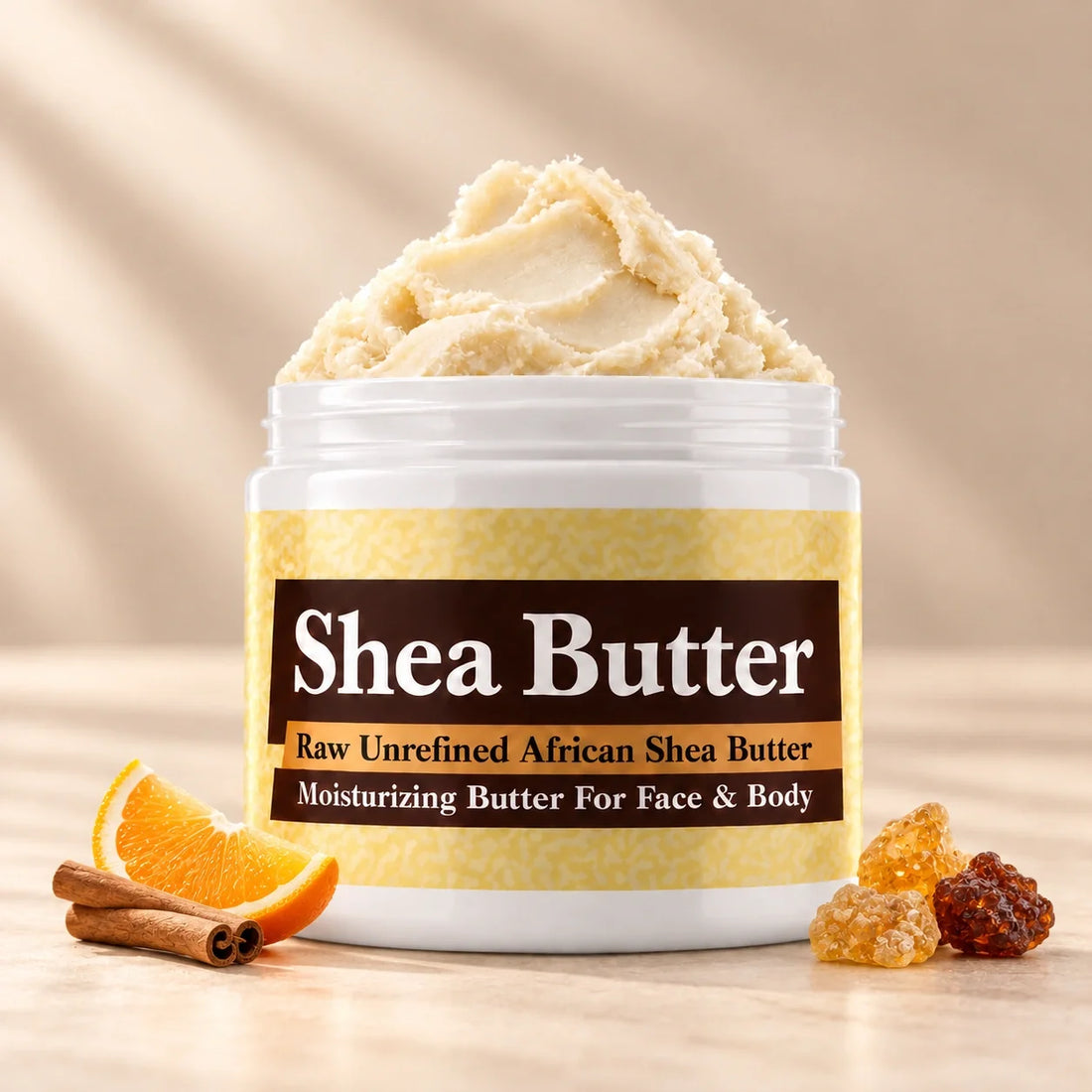 Frankincense & Myrrh Shea Butter in an open white jar with textured ivory shea butter and subtle scent accents on a soft cream background.