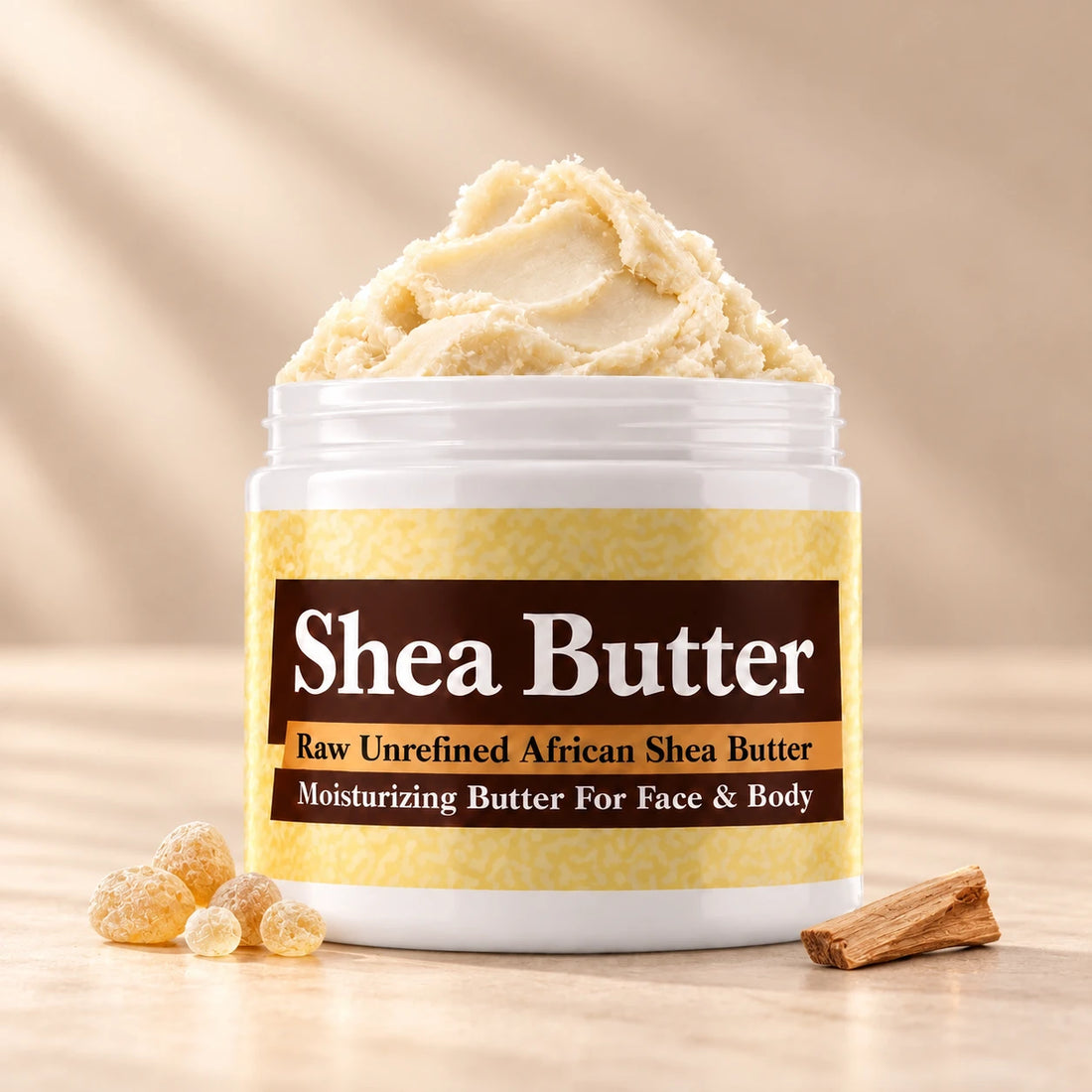 Frankincense Shea Butter in an open white jar with textured ivory shea butter and simple scent accents on a soft cream background.