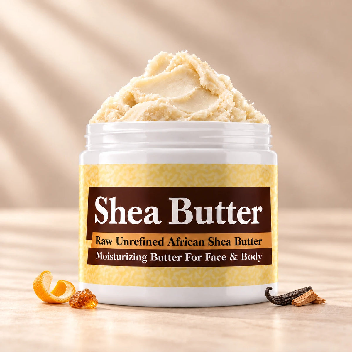 Imported Golden Sand Shea Butter in an open white jar with textured ivory shea butter and subtle scent accents on a soft cream background.