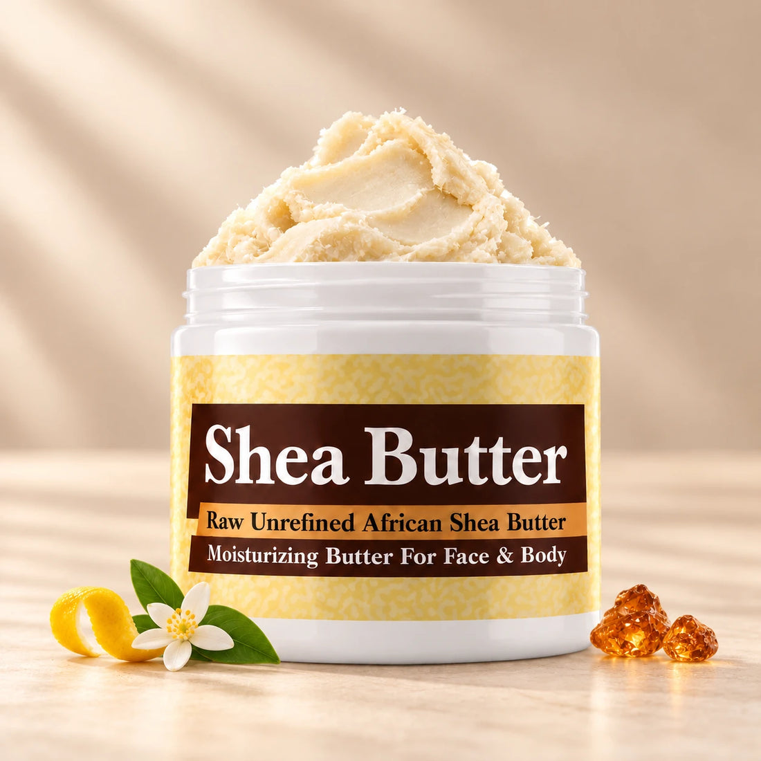 Jannatul Firdaus Shea Butter in an open white jar with textured ivory shea butter and simple scent accents on a soft cream background.