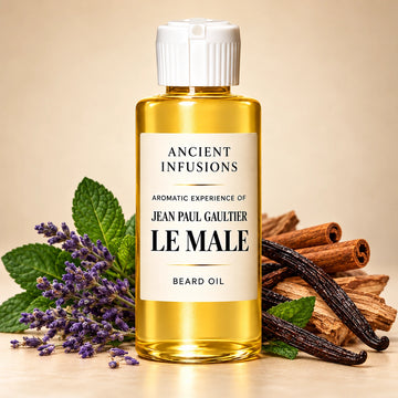 Ancient Infusions Jean Paul Gaultier Le Male aromatic experience beard oil bottle with a white cap and cream label