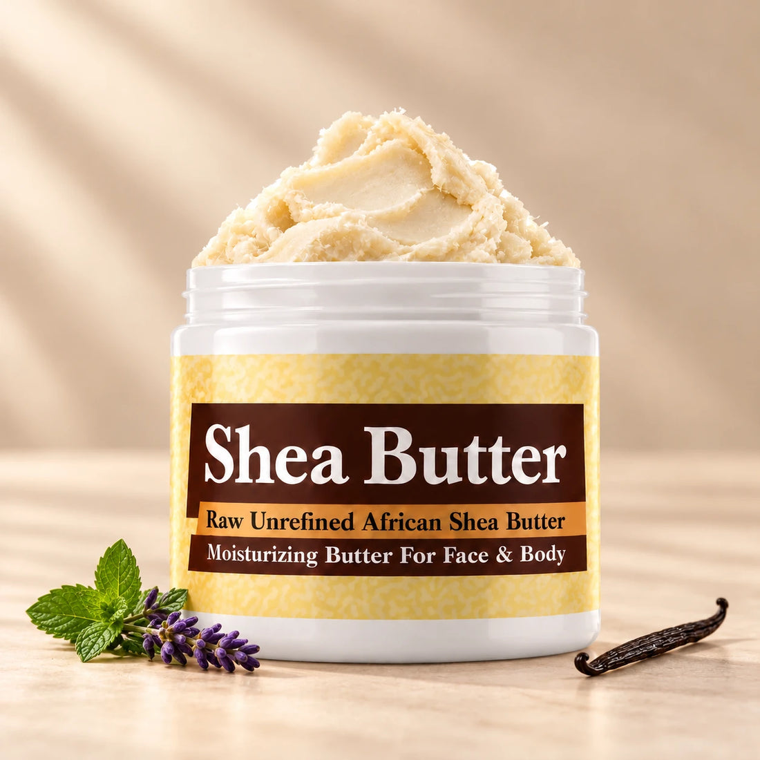 Jean Paul Gaultier Le Male Shea Butter in an open white jar with textured ivory shea butter and simple scent accents on a soft cream background.