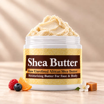 Juicy Couture Viva La Juicy Shea Butter in an open white jar with textured ivory shea butter and subtle scent accents on a soft cream background.