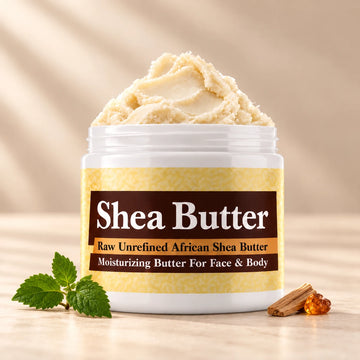 Patchouli Shea Butter in an open white jar with textured ivory shea butter and simple scent accents on a soft cream background.