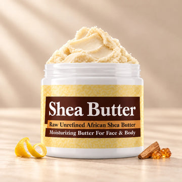Sabatt Shea Butter in an open white jar with textured ivory shea butter and simple scent accents on a soft cream background.