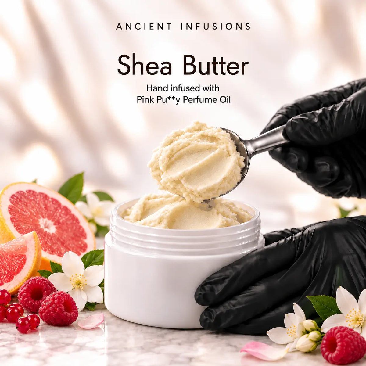 Black vinyl-gloved hands scoop raw shea butter hand infused with Pink Pu**y perfume oil.