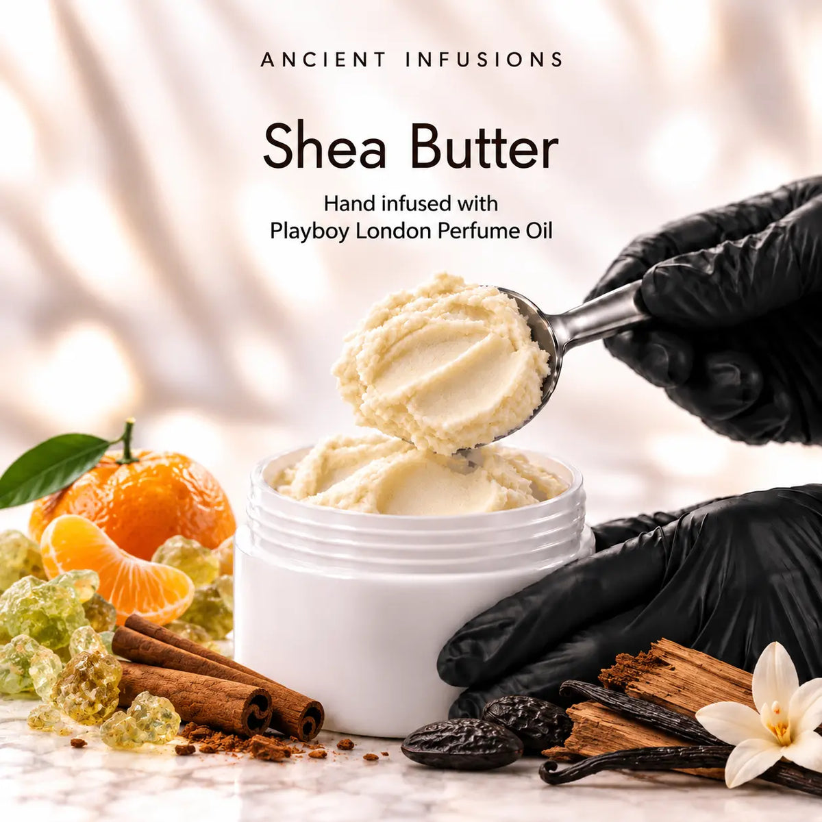Black vinyl-gloved hands scoop raw shea butter hand infused with Playboy London perfume oil.