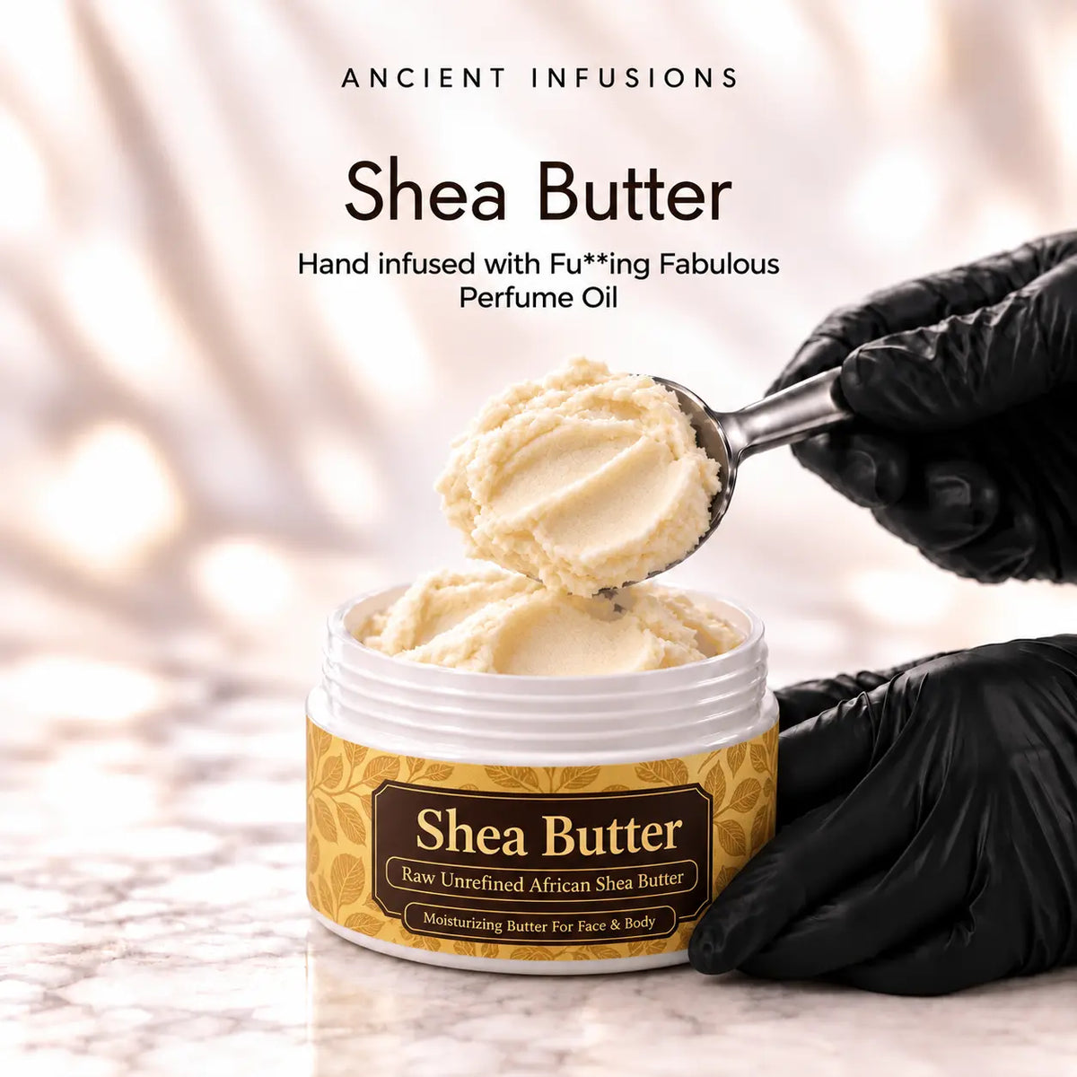 Black vinyl-gloved hands scoop raw shea butter hand infused with Fu**ing Fabulous perfume oil.