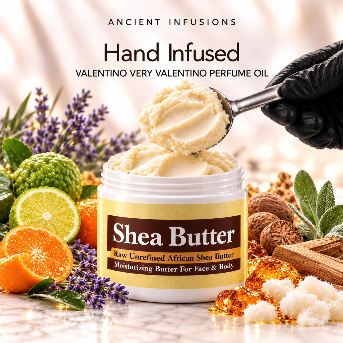 Black vinyl-gloved hands scoop raw shea butter hand infused with Valentino Very Valentino perfume oil.