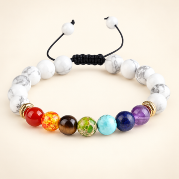 7 Chakra Howlite Adjustable Bracelet on a soft ivory background, view 1