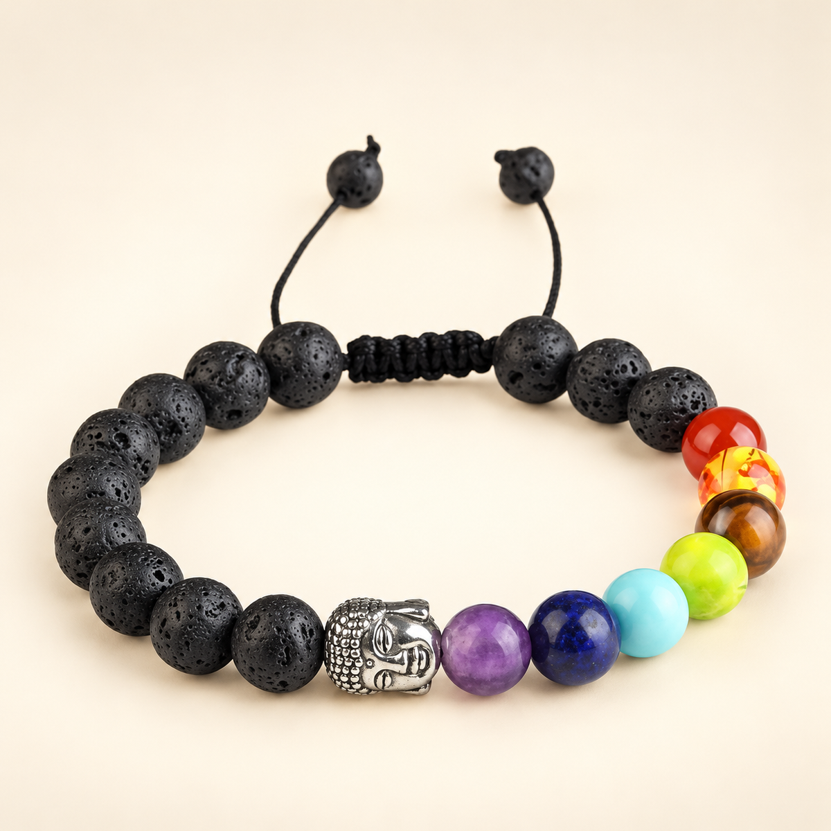 7 Chakra Lava Stone Buddha Adjustable Bracelet on a soft ivory background, view 2
