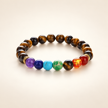 7 Chakra Tiger’s Eye Elastic Bracelet on a soft ivory background, view 1