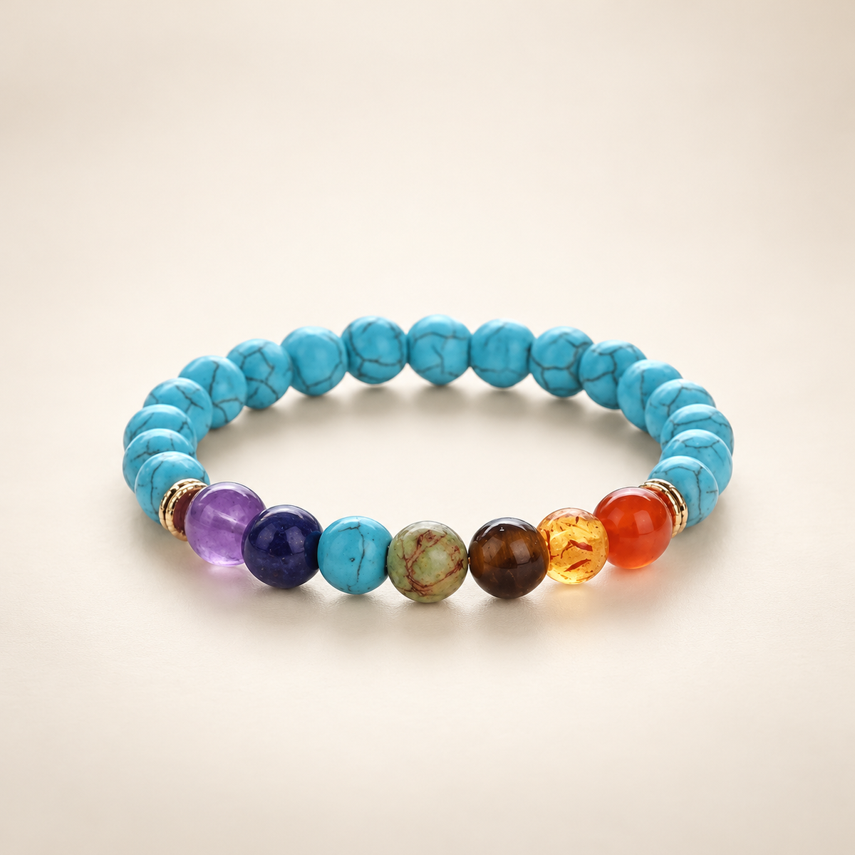 7 Chakra Turquoise Elastic Bracelet on a soft ivory background, view 1