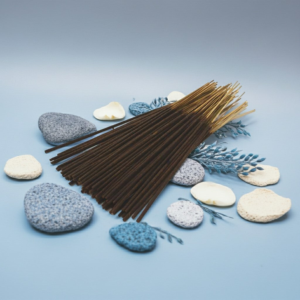 China Rain Incense Sticks with stones and plants on a light blue background