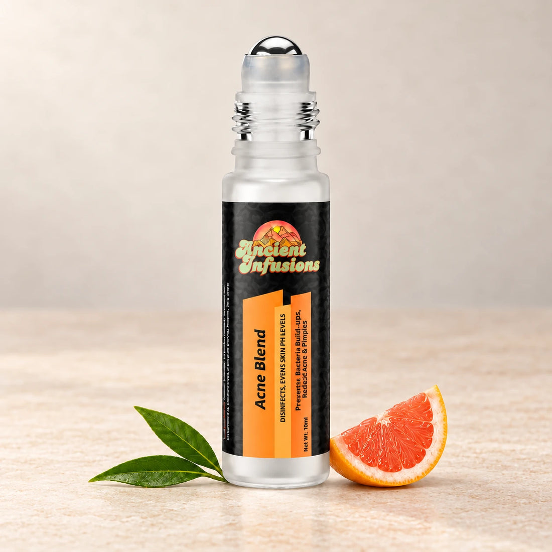 Ancient Infusions Acne Herbal Remedy Oil Clear Skin single roller bottle with botanical accents on a soft ivory stone background.