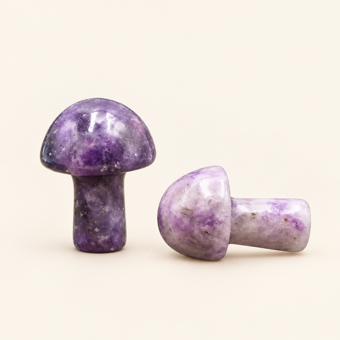 Amethyst Carved Mushroom with rich purple tones on a soft ivory background