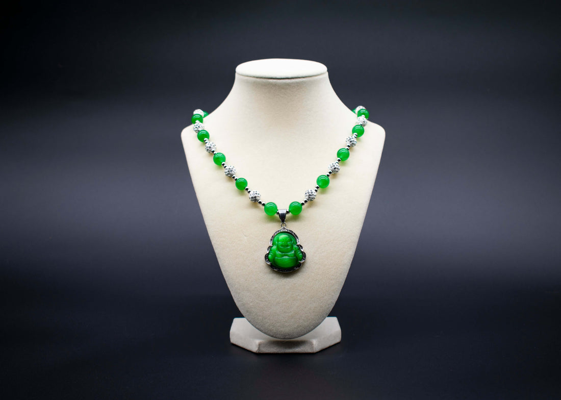 Ancient Infusions Custom Beaded Green Cat’s Eye Necklace with Laughing Buddha pendant, handcrafted with genuine crystals to promote joy, abundance, and positive energy.