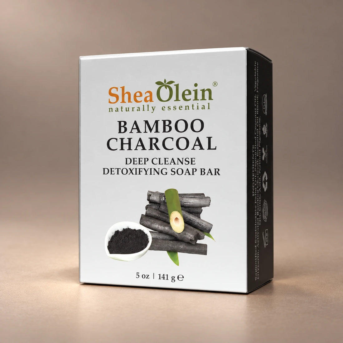 Shea Olein Bamboo Charcoal Bar Soap in its silver and black 5 oz box.