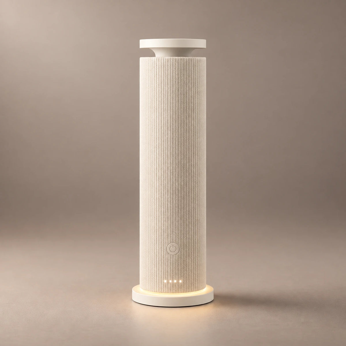 Beige HAVEN Air Pro waterless diffuser with a vertically ribbed fabric finish and warm base light.