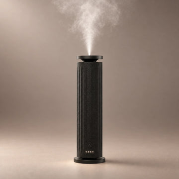 Black HAVEN Air Pro waterless diffuser with a vertically ribbed fabric finish and fragrance cloud.