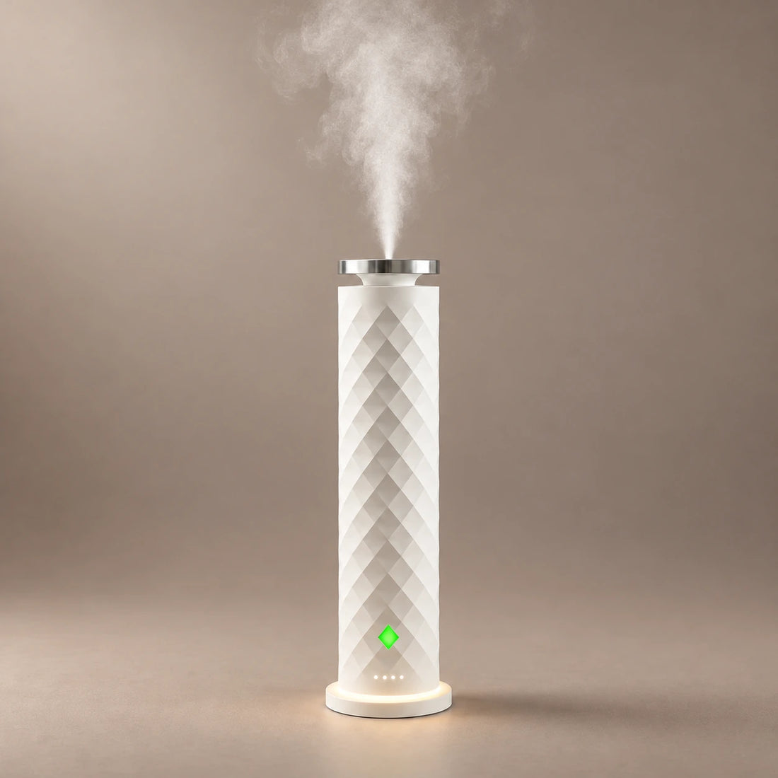 White HAVEN Air waterless diffuser with diamond faceting and a fragrance cloud rising from the top.