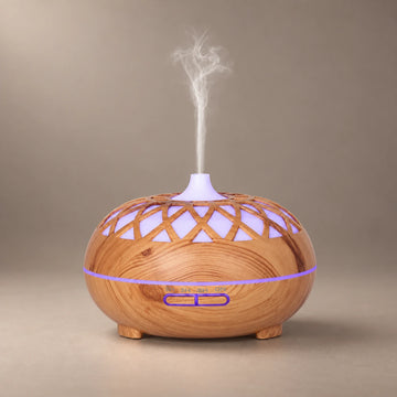 Brown 500 ml wood grain ultrasonic diffuser with a lattice top, violet LED light and cool mist.