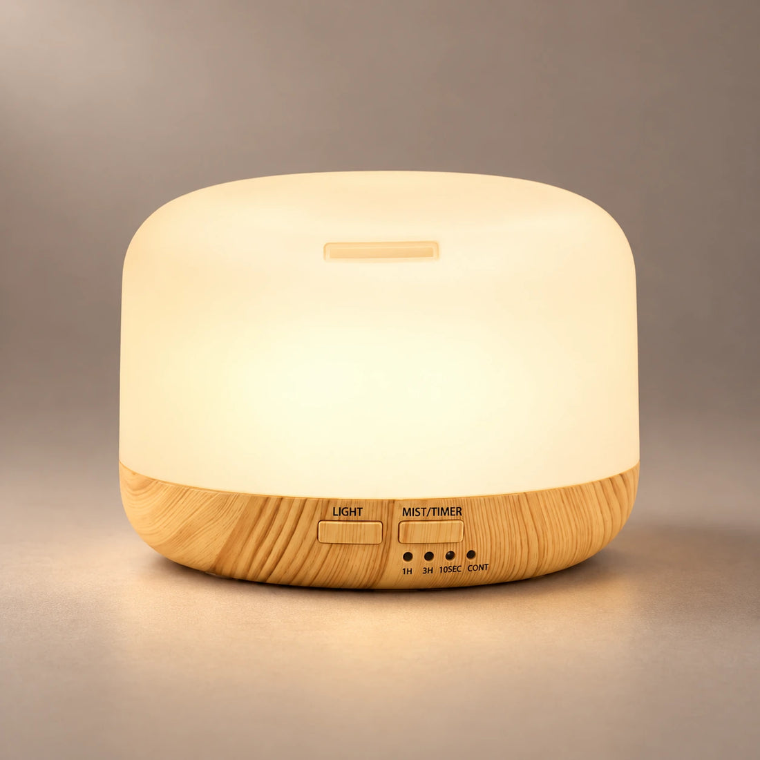 Modern 300 ml ultrasonic diffuser with a blue LED cover, wood grain base and cool mist.