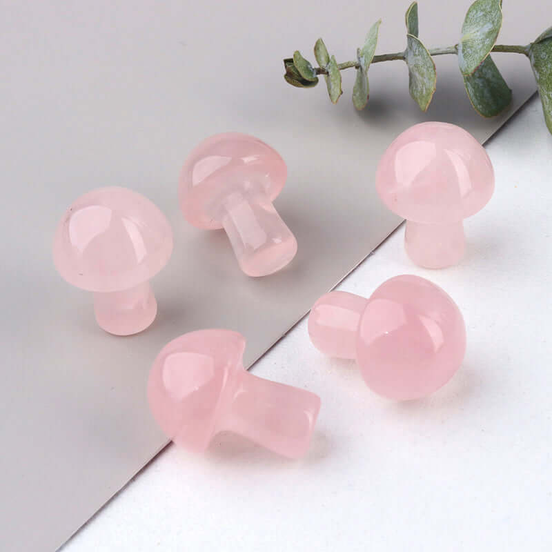 Ancient Infusions Rose Quartz Carved Mushroom - ~0.8 inches of love-infused elegance. Front view highlighting the delicate craftsmanship and gentle pink hues.