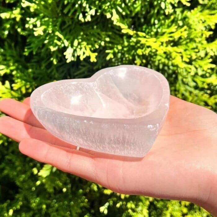 Experience pure serenity with Ancient Infusions' Selenite Heart Bowl, a powerful crystal cleanser for your space.