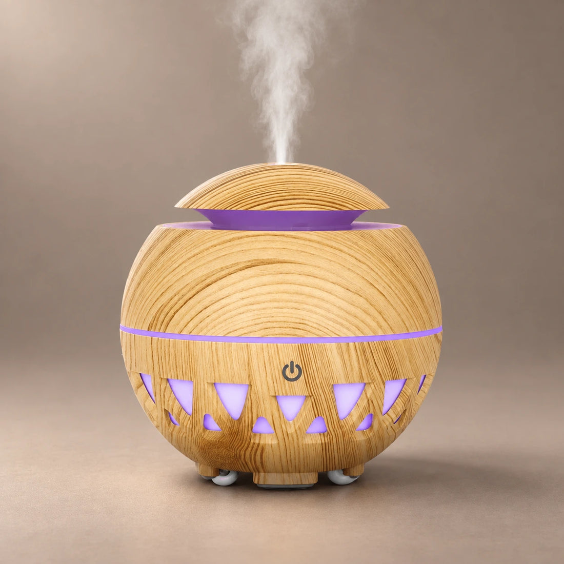 Black sphere wood grain ultrasonic diffuser with green LED light, triangular cutouts and cool mist.