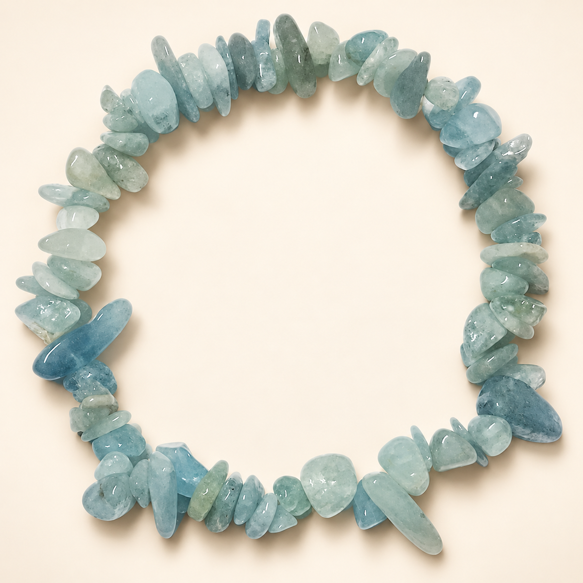 Aquamarine Chips Elastic Bracelet on a soft ivory background, view 1