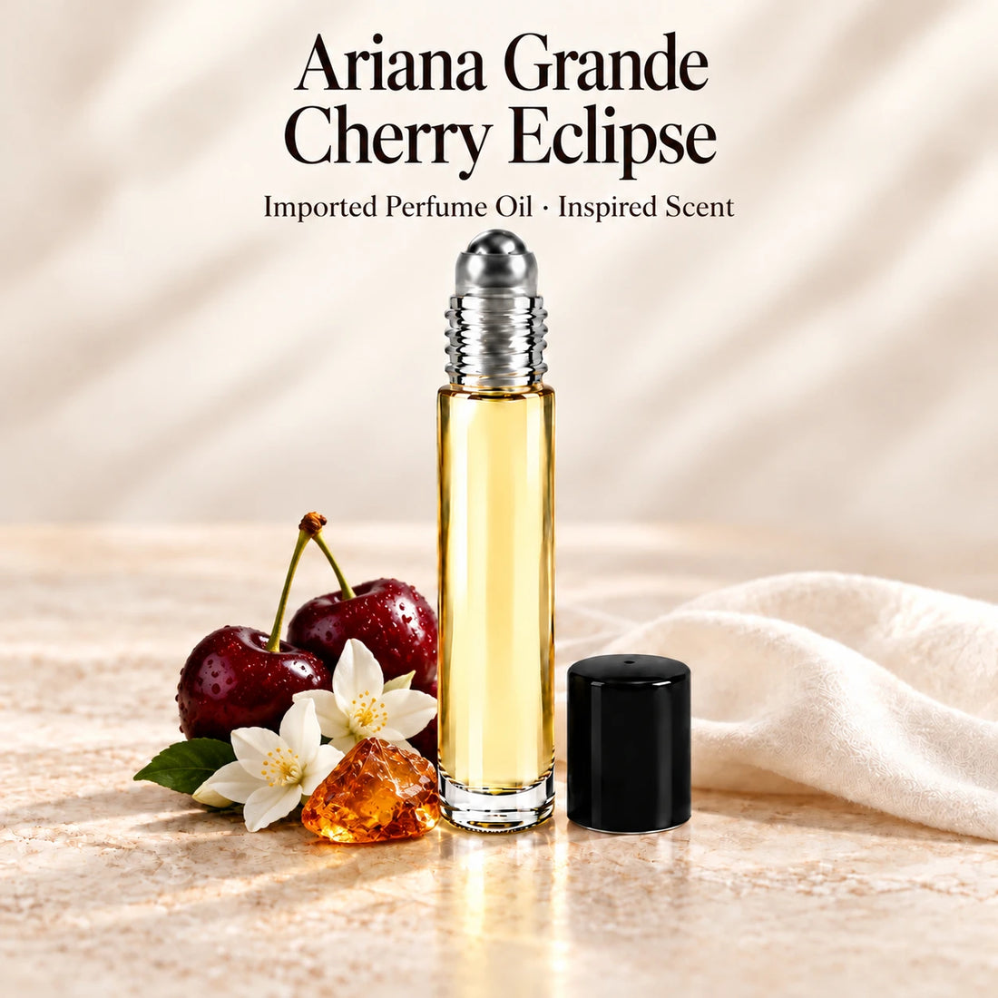 Ariana Grande Cherry Eclipse Perfume Oil in a slim glass roll-on bottle with a silver roller and black cap on an ivory stone surface.
