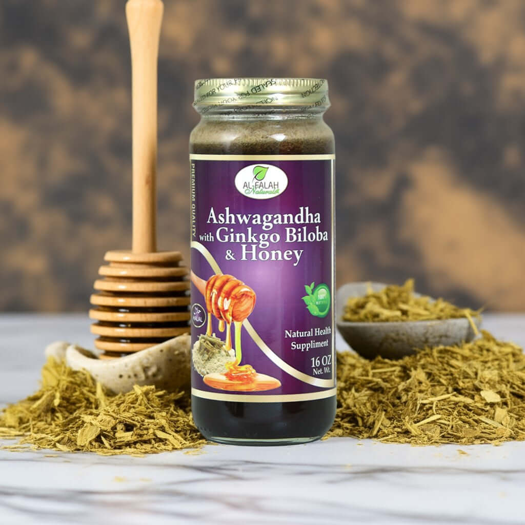 Jar of Ashwagandha & Ginkgo Biloba Herbal Honey with energizing herbs on marble surface.