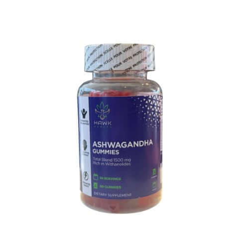 Bottle of Hawk Ashwagandha gummies with gummy bears on a wooden surface