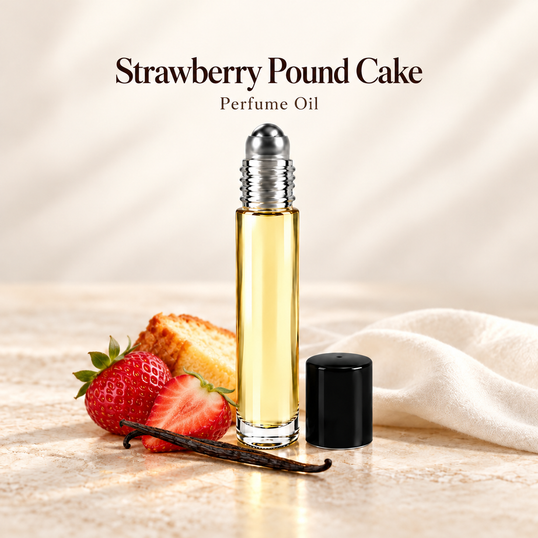 Bath & Body Works Strawberry Pound Cake Perfume Oil with simple scent note accents on soft ivory