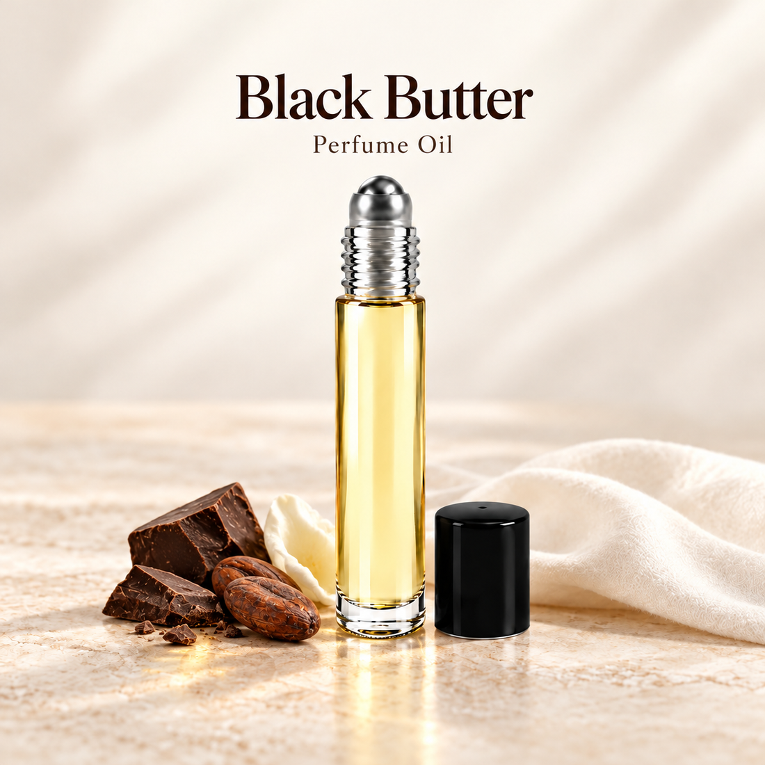 Black Butter Perfume Oil with simple scent note accents on soft ivory