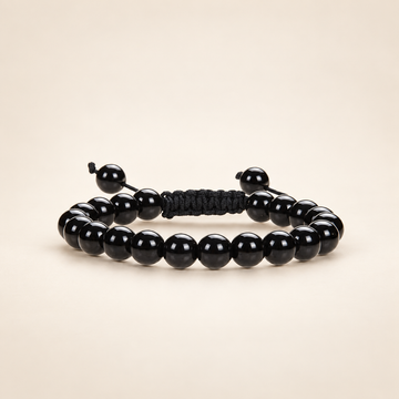 Black Obsidian Adjustable Bracelet on a soft ivory background, view 1