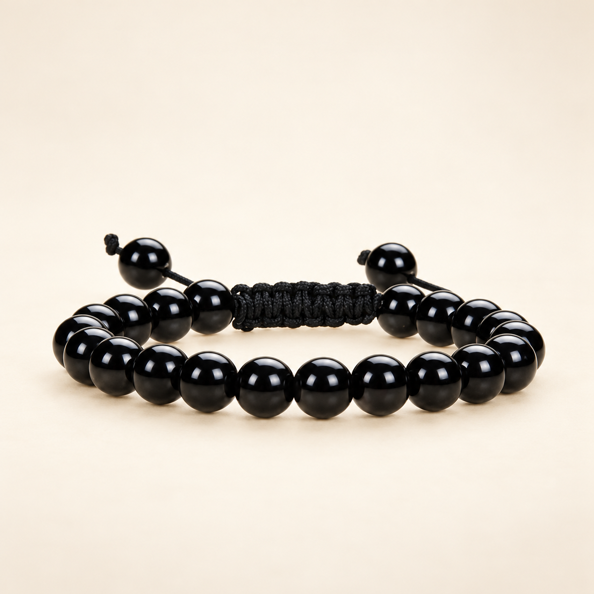Black Obsidian Adjustable Bracelet on a soft ivory background, view 2