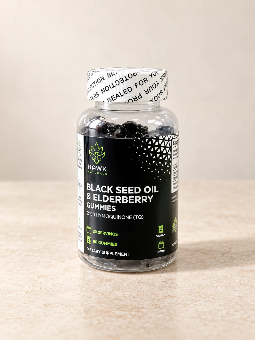 Black Seed & Elderberry Gummies 30 Day product packaging on a warm ivory background