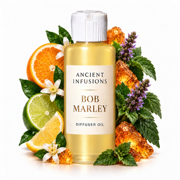 Bob Marley Diffuser Oil by Ancient Infusions with golden oil, white cap and matching scent artwork