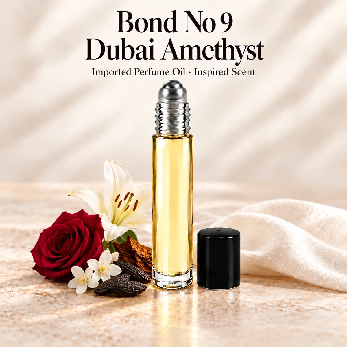 Bond No 9 Dubai Amethyst Perfume Oil in a slim glass roll-on bottle with a silver roller and black cap on an ivory stone surface.