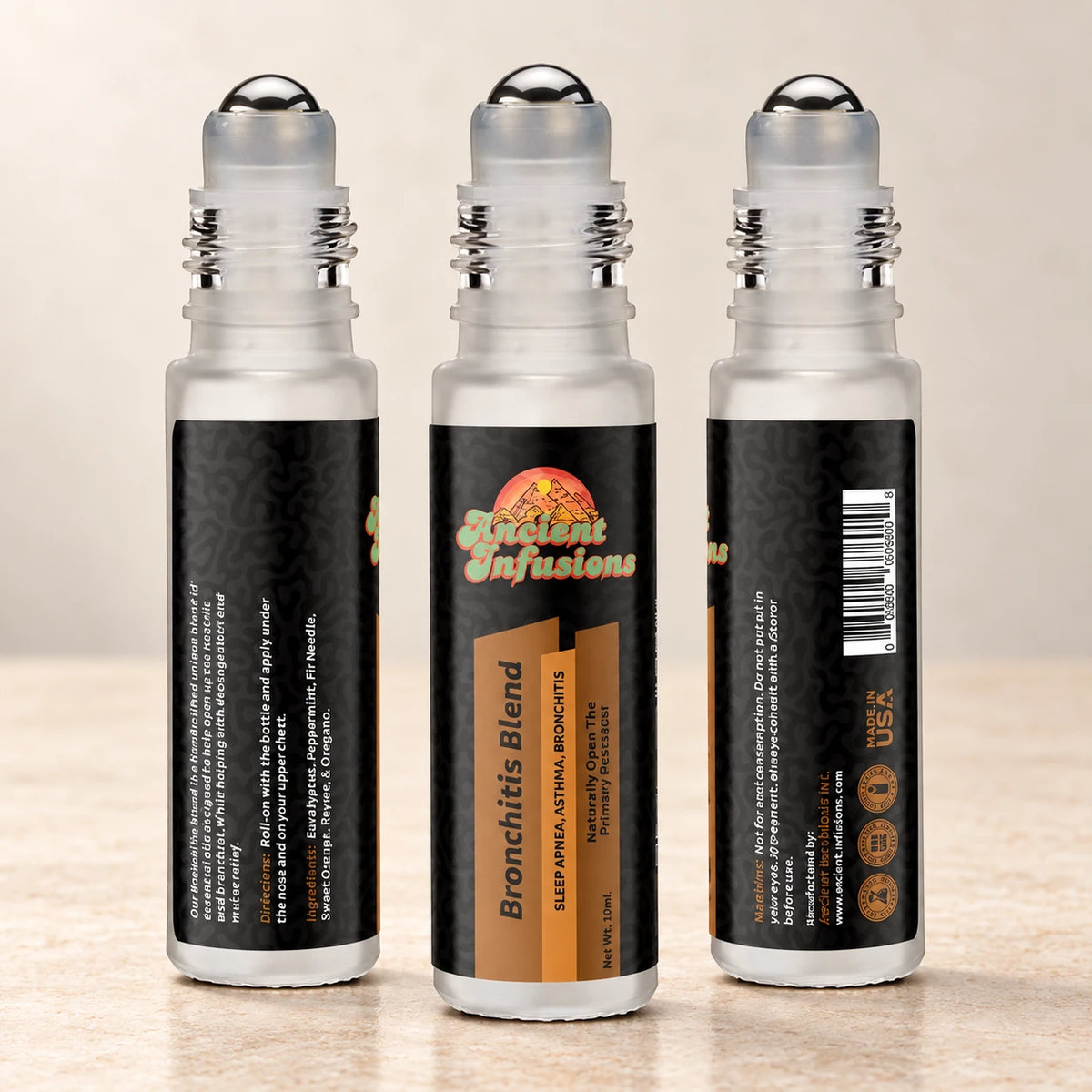 Ancient Infusions Bronchitis Herbal Remedy Oil Fresh & Clear front, side and back bottle views on a soft ivory stone background.