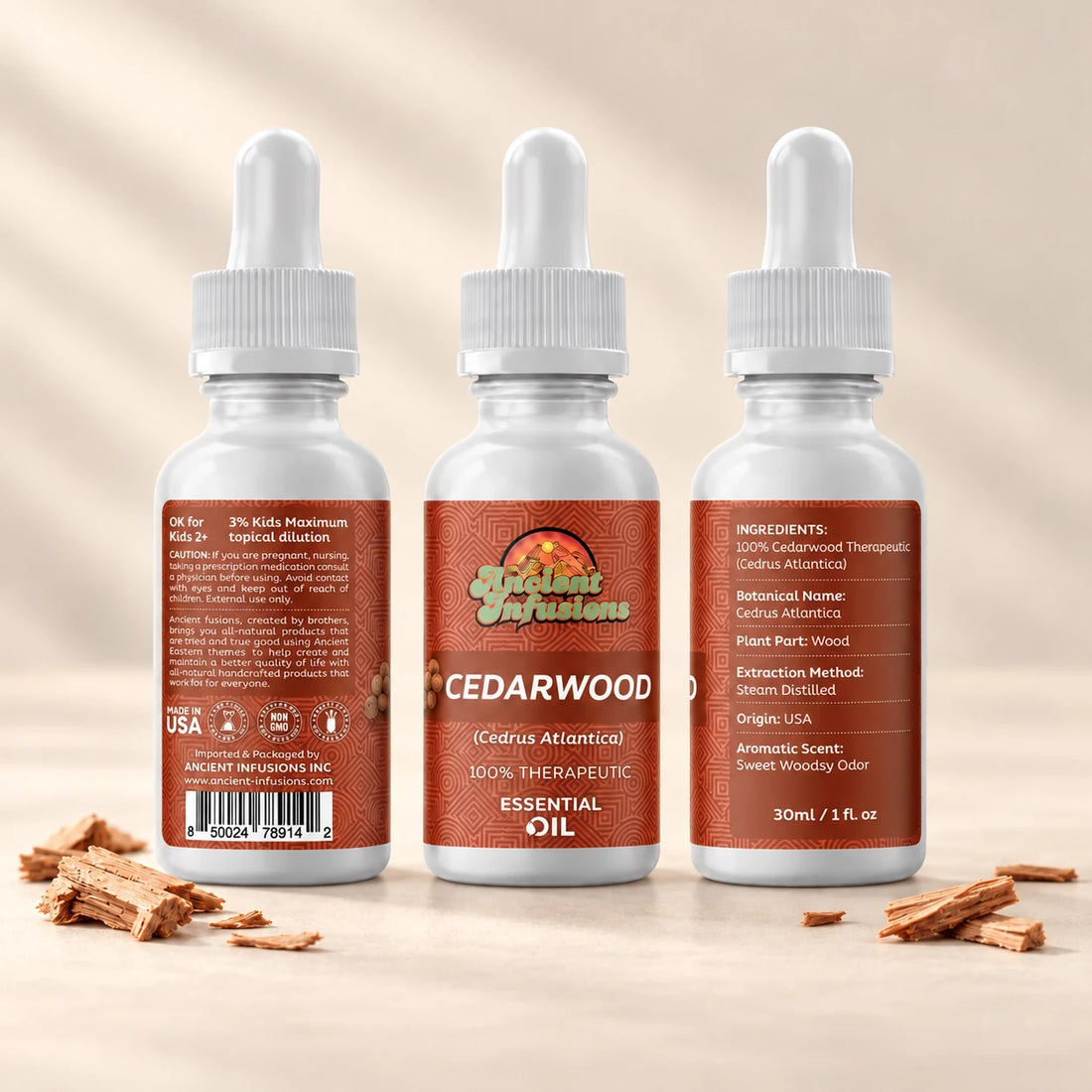 Ancient Infusions Cedarwood Atlas Essential Oil bottle with botanicals on a soft ivory background.