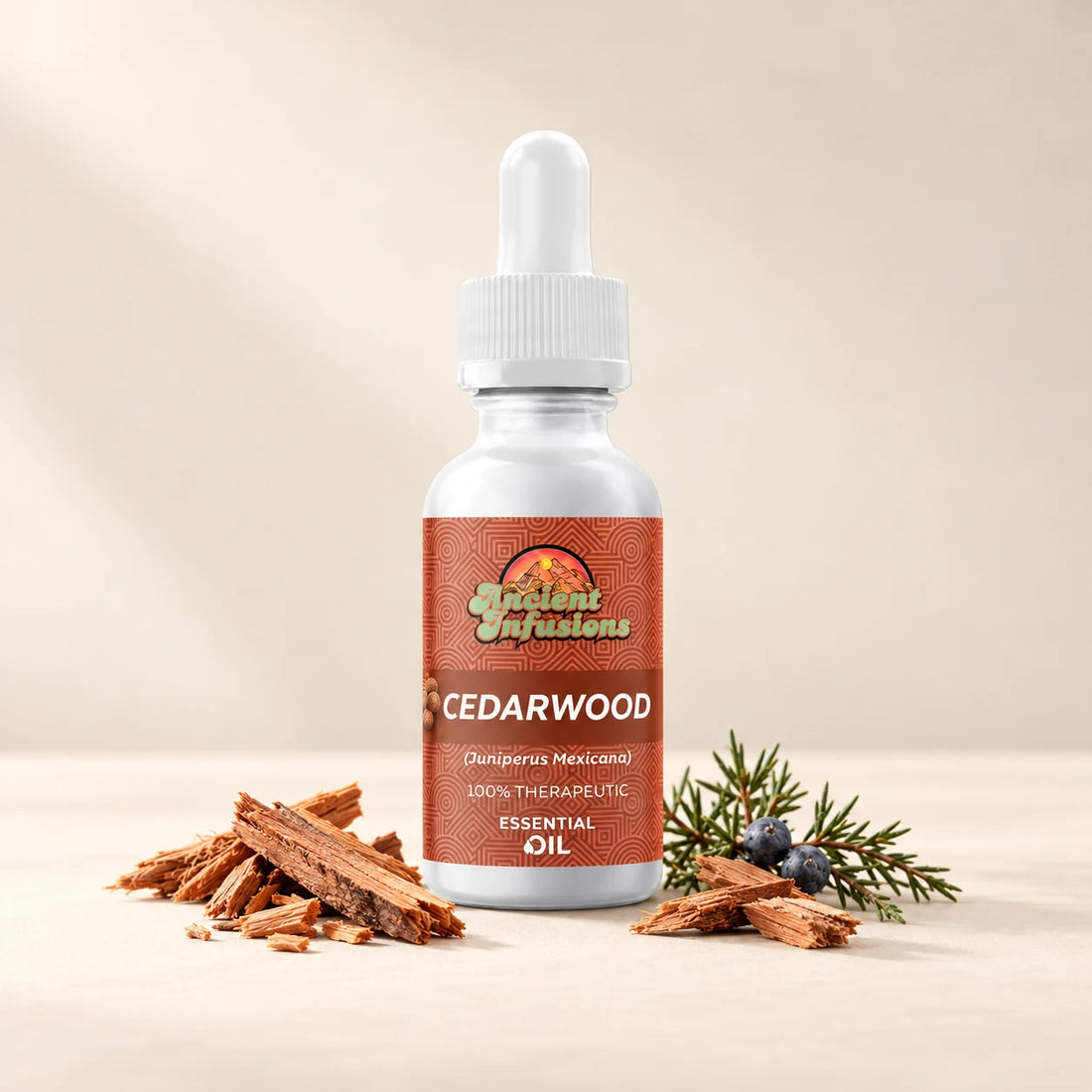 Ancient Infusions Cedarwood Texas Essential Oil bottle with botanicals on a soft ivory background.